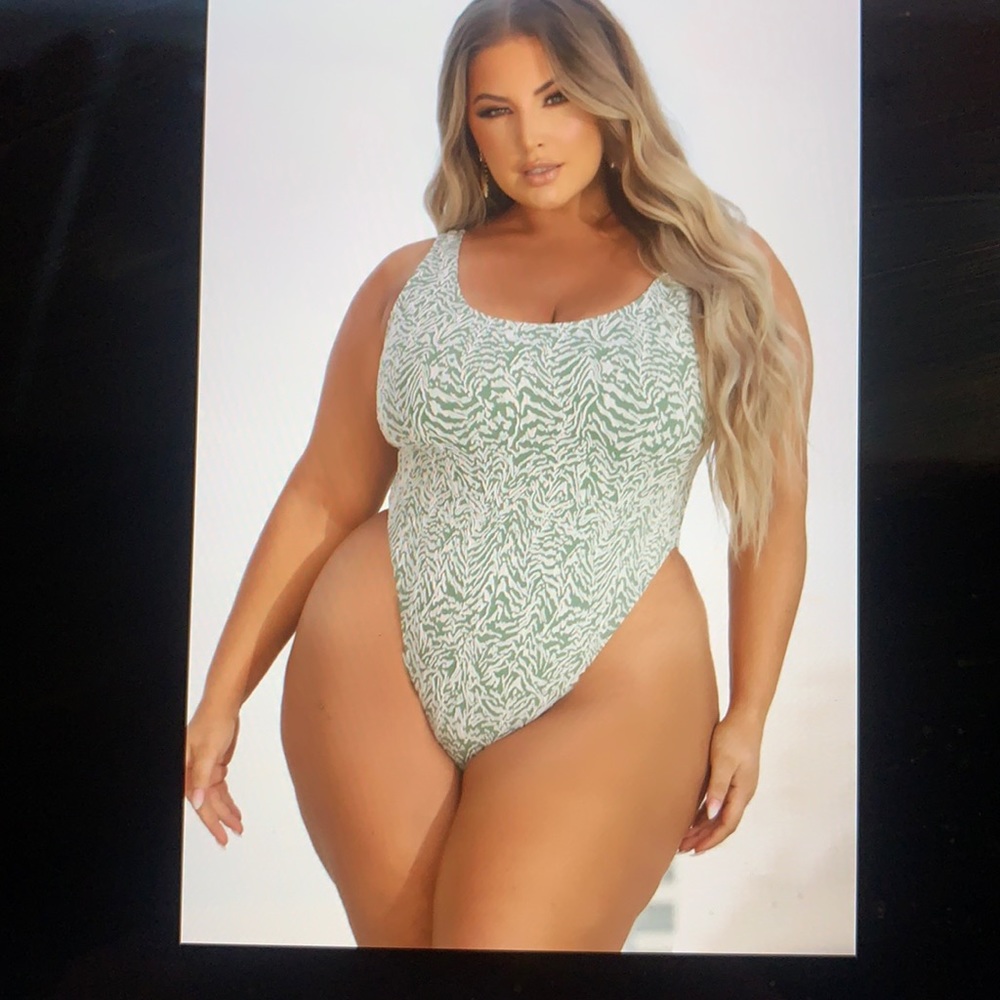 High cut leg, low back one piece - never worn